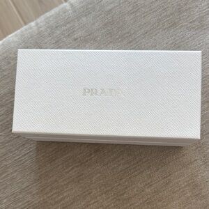 Prada Textured White Gift Box
Size: 7.75”x3.75”x3.25”
